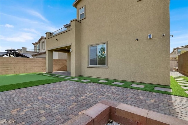 back of property with a patio area