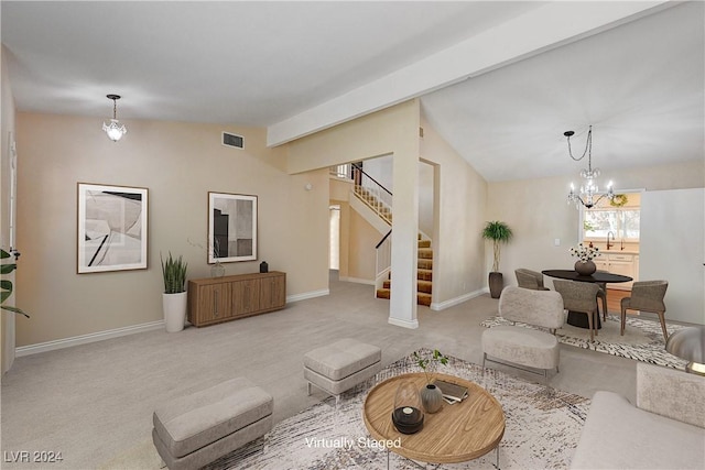 living room featuring carpet, a notable chandelier, lofted ceiling, and sink