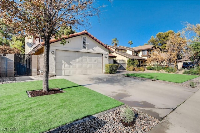 view of front facade with a garage and a front yard