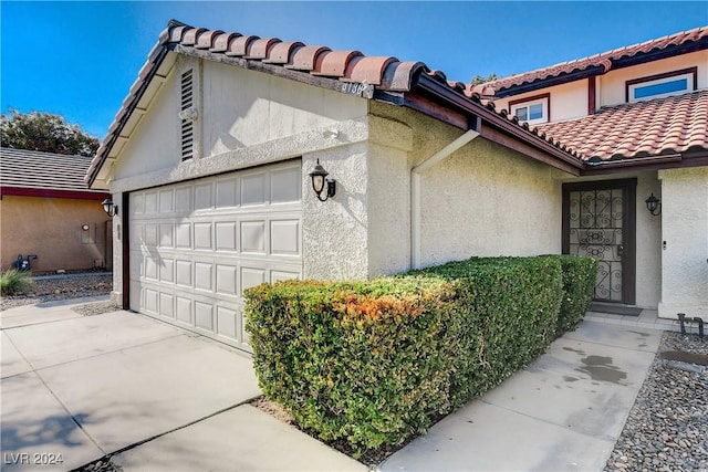 exterior space with a garage