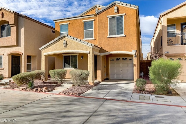 view of front of property with a garage