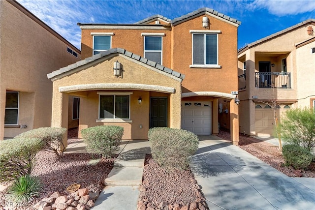 view of front of property with a garage