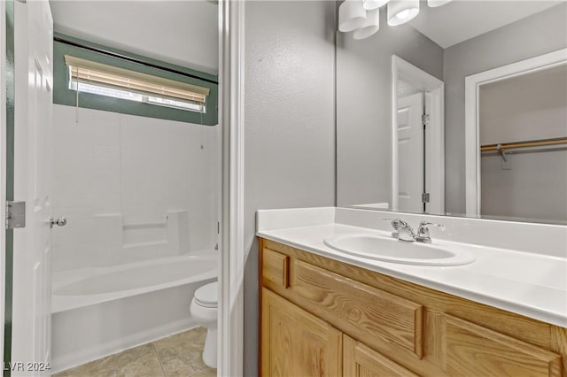 full bathroom featuring tile patterned flooring, vanity, toilet, and tub / shower combination