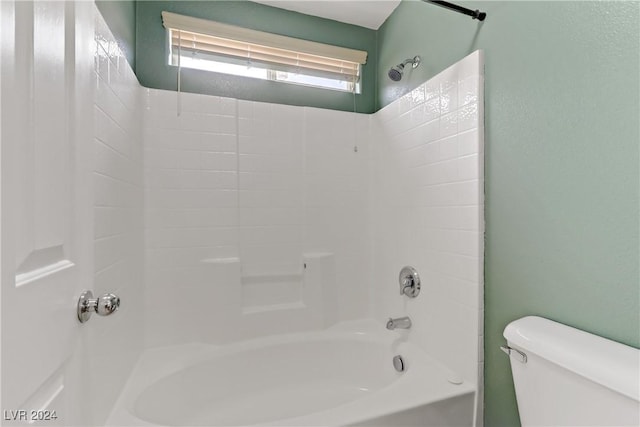 bathroom featuring toilet and shower / washtub combination