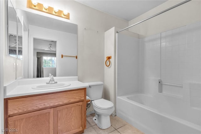 full bathroom featuring ceiling fan, tile patterned flooring, toilet, vanity, and shower / bathtub combination