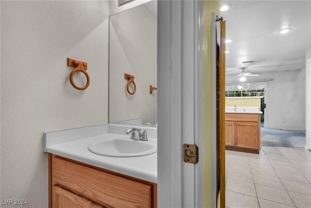 bathroom featuring vanity, tile patterned floors, and ceiling fan