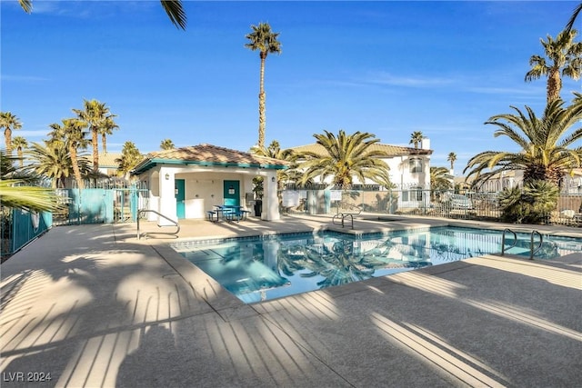 view of pool featuring a patio area