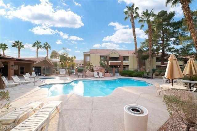 view of pool featuring a patio