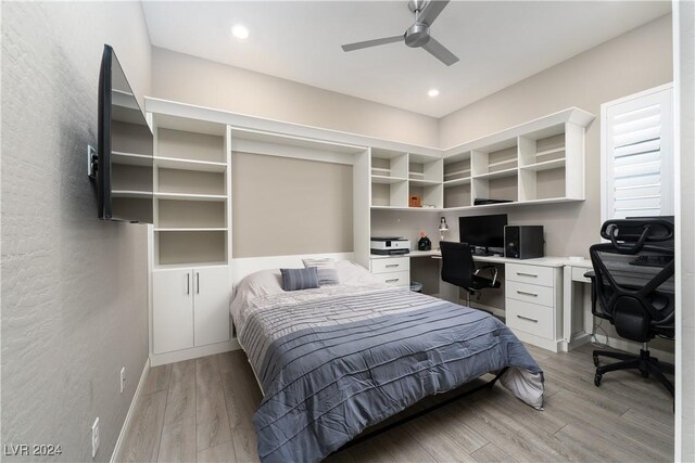 bedroom with ceiling fan and light wood-type flooring