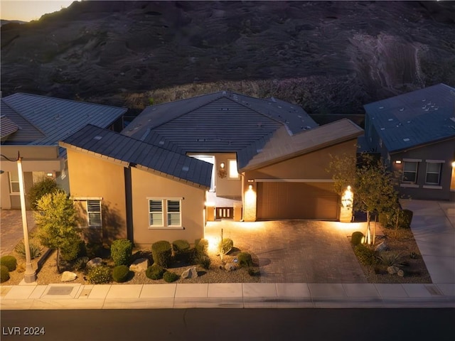 view of front of property featuring a garage