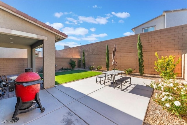 view of patio / terrace with a grill