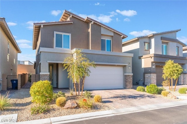 view of front of property with a garage