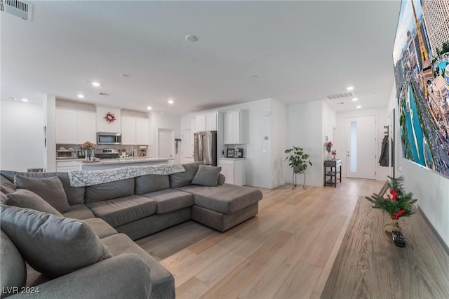 living room with light wood-type flooring