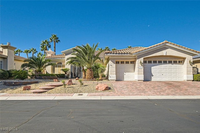 view of front of property featuring a garage