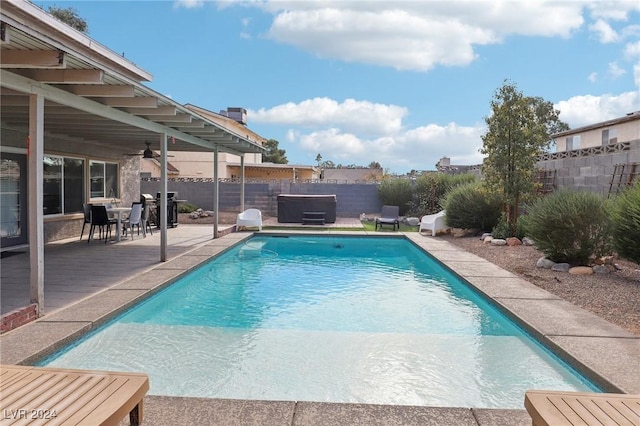 view of swimming pool with a patio