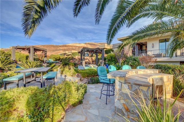 view of patio with a bar