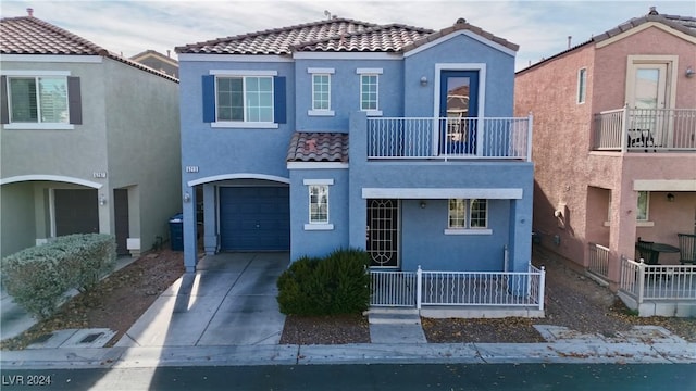 view of front of property with a garage