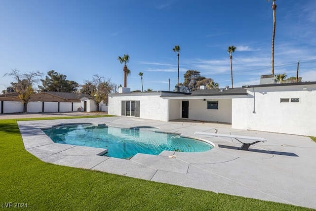 view of swimming pool with a patio