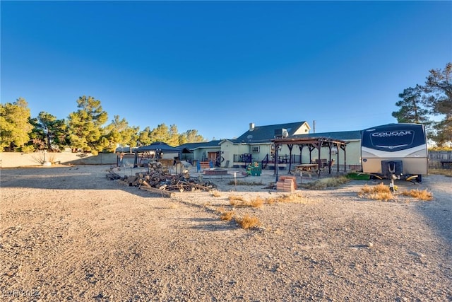 view of front of home featuring a patio area and a pergola