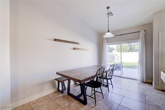 dining area featuring light tile patterned floors