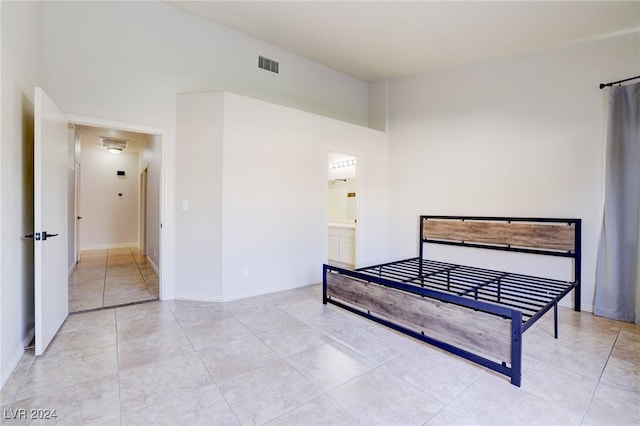 bedroom featuring connected bathroom