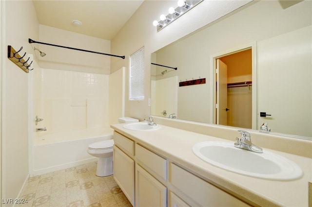 full bathroom featuring vanity, toilet, and tub / shower combination