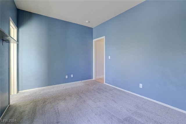 unfurnished bedroom with carpet flooring