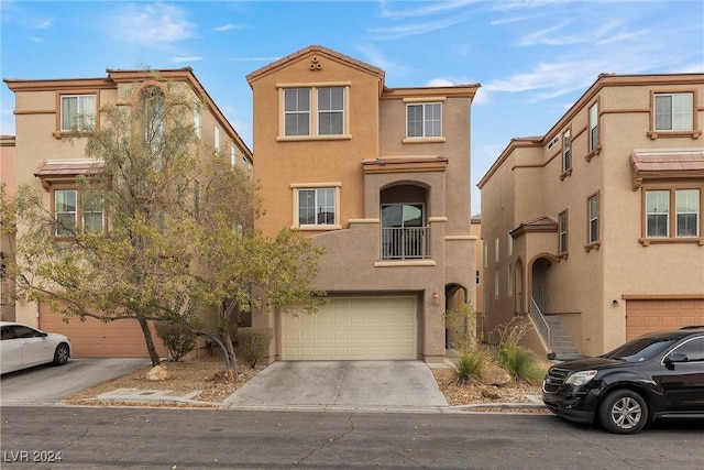 view of front of home with a garage