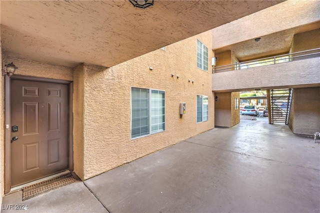 doorway to property featuring a balcony