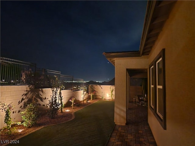 view of patio at night