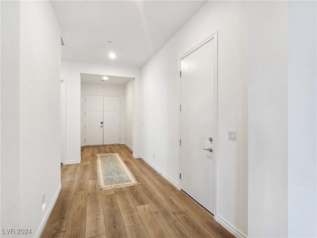 hall featuring light wood-type flooring