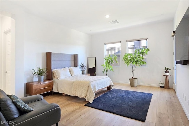 bedroom with light wood-type flooring