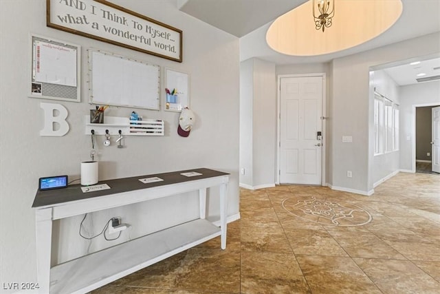 view of tiled foyer entrance