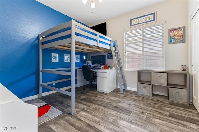 bedroom featuring hardwood / wood-style flooring