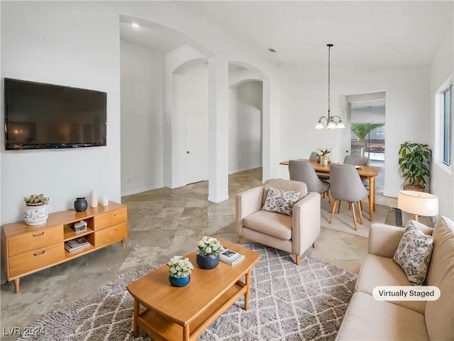 living room with a chandelier