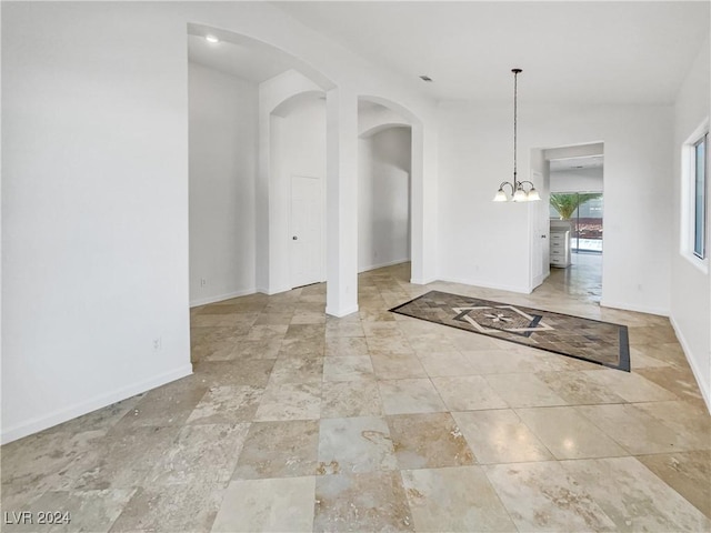 interior space with a chandelier