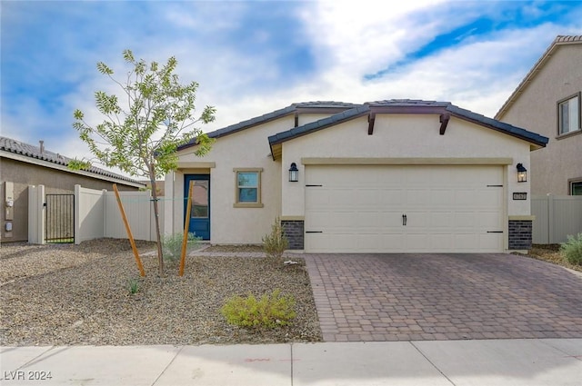 view of front of home with a garage