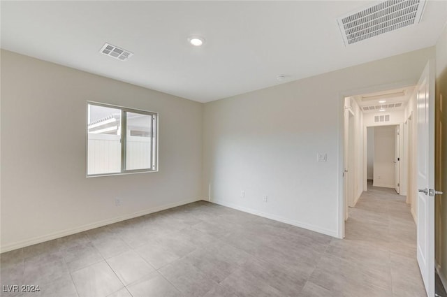 empty room featuring light tile patterned flooring