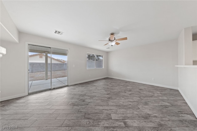 unfurnished room featuring ceiling fan