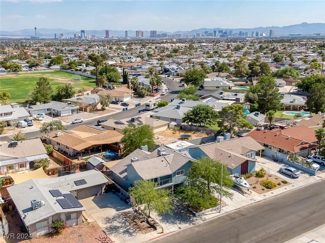 drone / aerial view featuring a mountain view