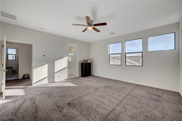 empty room with carpet and ceiling fan