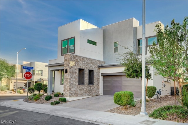 modern home featuring a garage