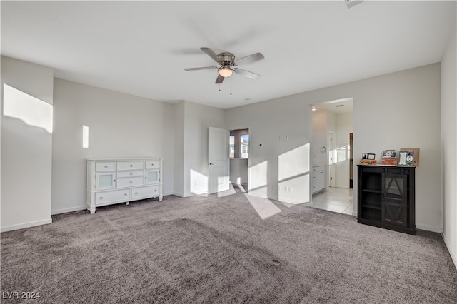 interior space featuring ceiling fan