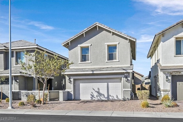 front facade with a garage