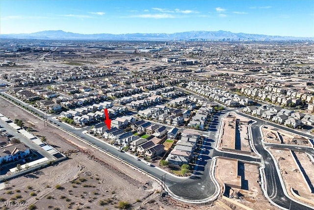 bird's eye view with a mountain view