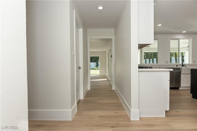 hall featuring light hardwood / wood-style flooring