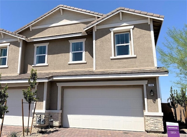 view of front of property featuring a garage