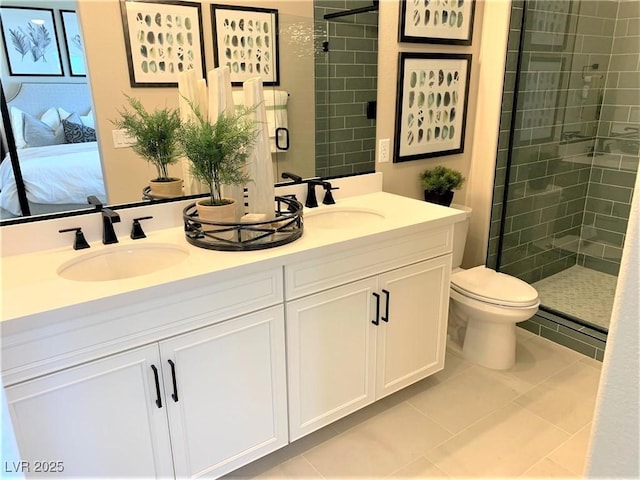 bathroom with vanity, tile patterned flooring, toilet, a baseboard radiator, and an enclosed shower