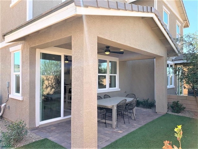 view of patio with ceiling fan