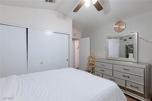 bedroom with vaulted ceiling and ceiling fan